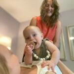 Chiropractor with baby during session